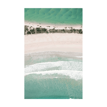 Aerial view of Broulee Beach on the South Coast of NSW, showcasing turquoise waters, soft white sand, and gentle rolling waves in a minimalist coastal composition.