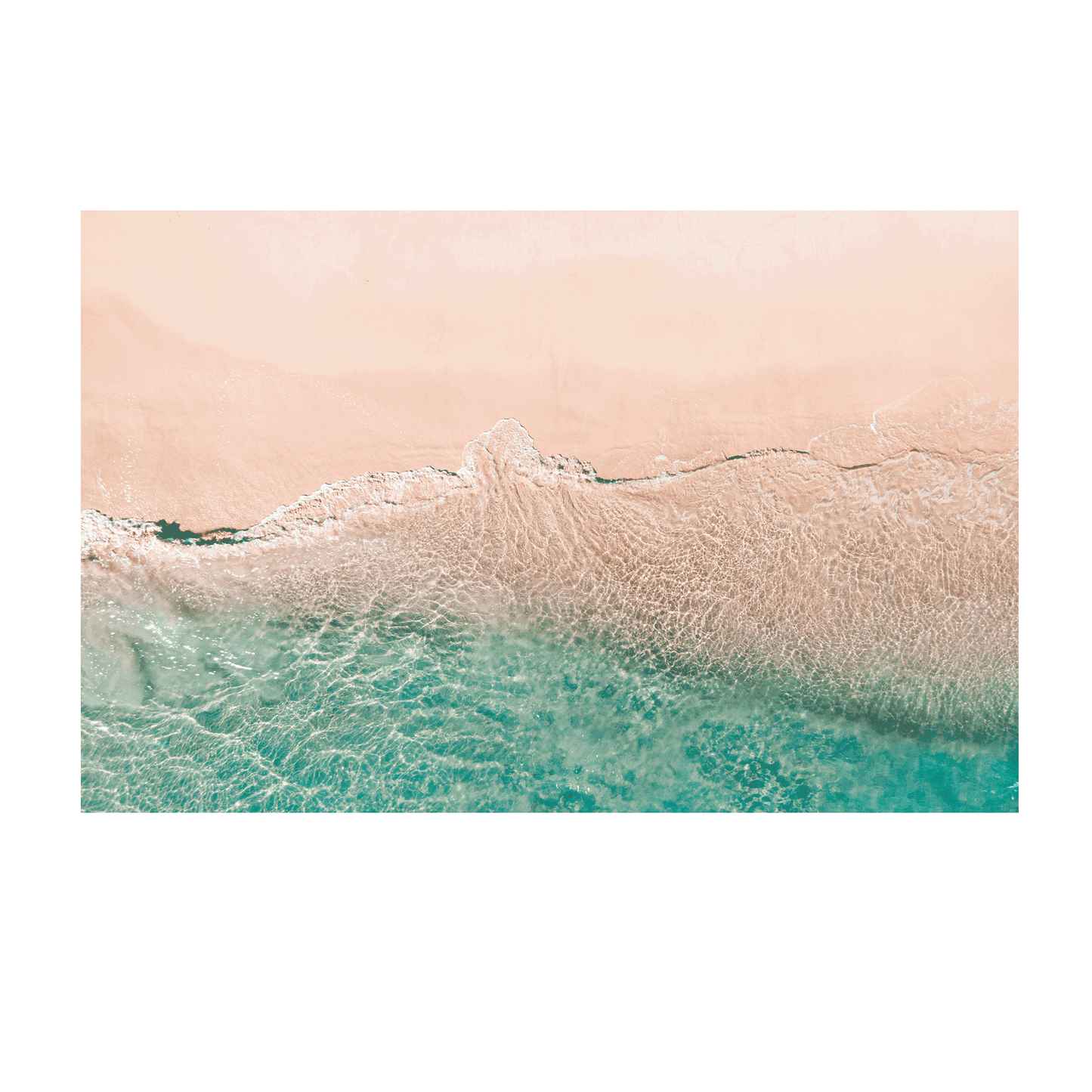 A soft aerial coastal scene at Norah Head, NSW, showcasing the gentle transition between sandy beach and clear aqua ocean waters.
