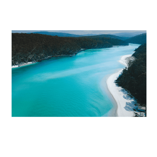 Aerial print of Pambula Beach on the South Coast of NSW, featuring stunning turquoise waters winding through lush coastal forests and pristine white sand. A breathtaking seascape perfect for modern coastal-inspired wall art.