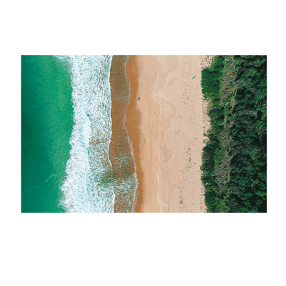 A stunning aerial view of Putty Beach, Central Coast, showing vibrant turquoise waves, golden sand, and lush greenery in perfect symmetry.