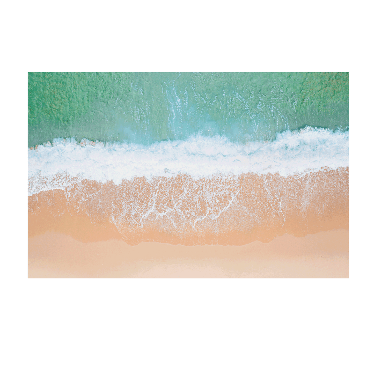 An aerial view of Wamberal Beach, NSW, showcasing waves washing onto golden sand with soft aqua and turquoise ocean tones.
